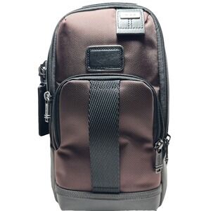 Tumi FIFE Slim Sling Bag Copper and Black NWOT